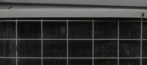 Old rusty AC unit in Tampa, FL