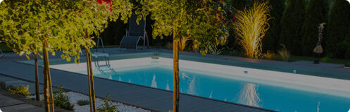 Outdoor pool with lighting on the rim